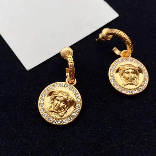 Versace Medusa Icon Boucles d'oreilles pendantes en cristal doré 6
