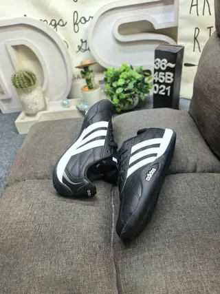 Adidas Black and White Three-Stripe Lifestyle Sneakers 6