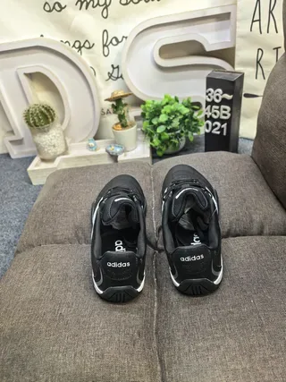 Adidas Black and White Three-Stripe Lifestyle Sneakers 8
