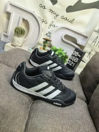 Adidas Black and White Three-Stripe Lifestyle Sneakers 9