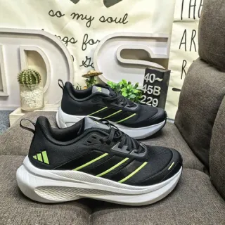 Adidas Zapatillas de correr negras y verdes con upper de malla, tres rayas neón