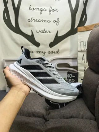 Adidas Zapatillas de correr negras y verdes con upper de malla, tres rayas neón 15