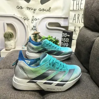 Adidas Chaussures de course avec upper en tricot bleu gris dégradé, midsole sculpté blanc
