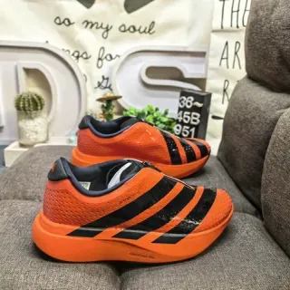 Adidas बिना लेस के स्लिप ऑन नारंगी काला लाइफस्टाइल जूते