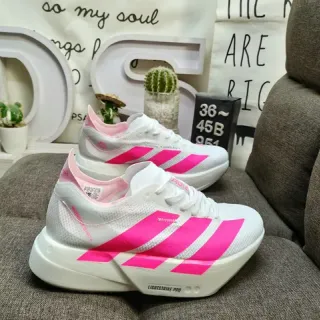Adidas Lightstrike Pro zapatillas de correr blancas y rosadas