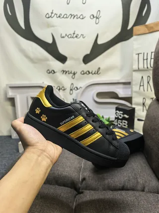Adidas Superstar Black and Gold Paw Print Lifestyle Sneakers 5
