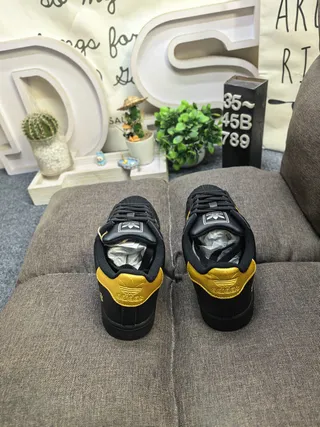 Adidas Superstar Black and Gold Paw Print Lifestyle Sneakers 8