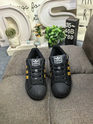 Adidas Superstar Black and Gold Paw Print Lifestyle Sneakers 10