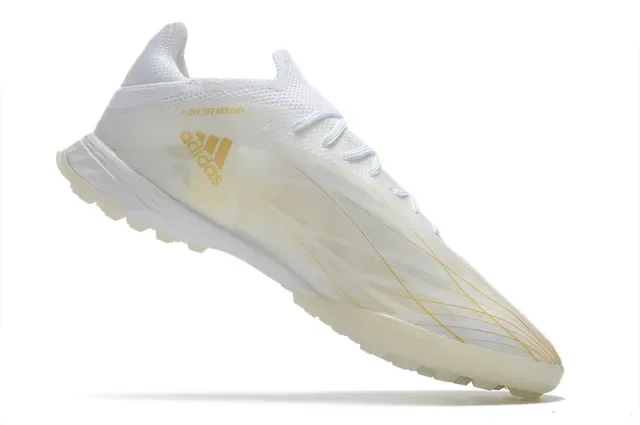 Adidas Chaussures de football turf blanches et dorées à profil bas en matériau synthétique avec rayures métalliques 2