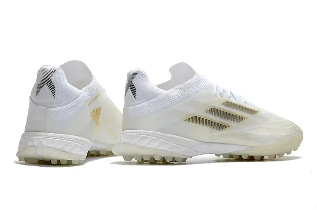 Adidas Chaussures de football turf blanches et dorées à profil bas en matériau synthétique avec rayures métalliques 5