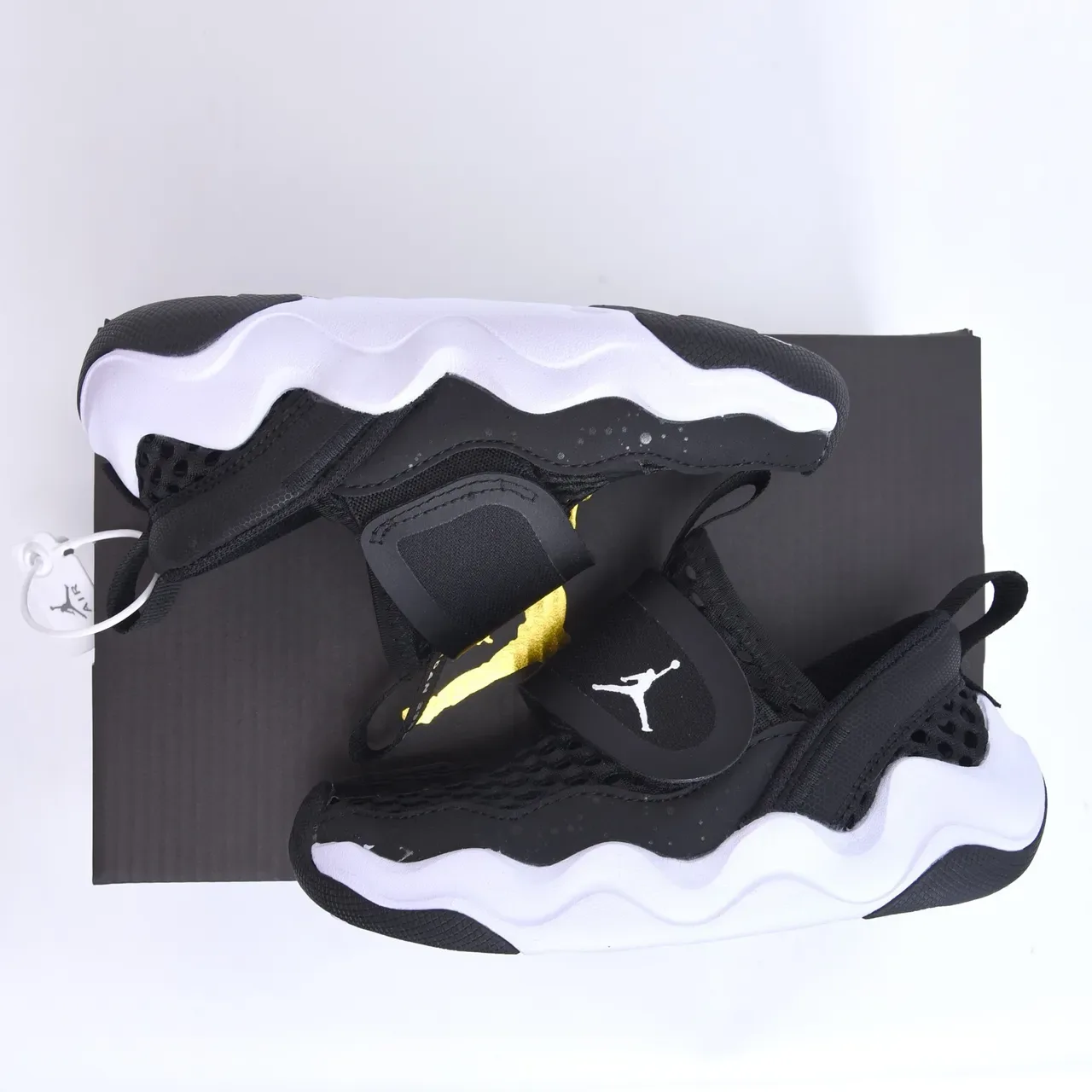 Baskets lifestyle sans lacets en mesh perforé noir et blanc Air Jordan 10