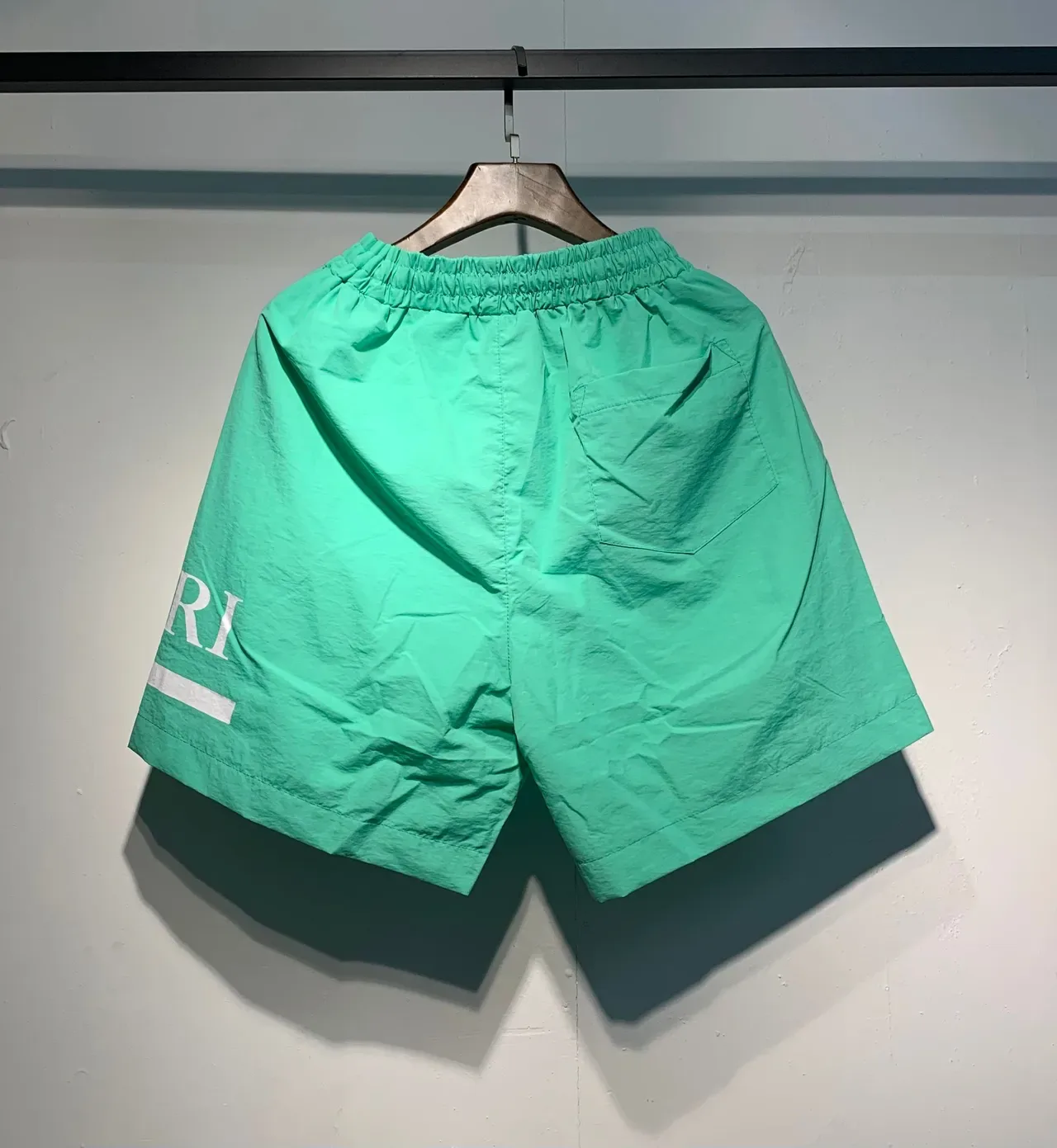 AMI Paris Black Green Lightweight Synthetic Fabric Side Logo Print Shorts 6