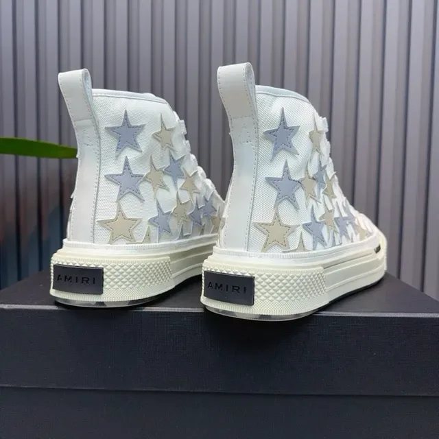 Amiri Skel Top baskets lifestyle à lacets hauts blancs avec étoile appliquée 3