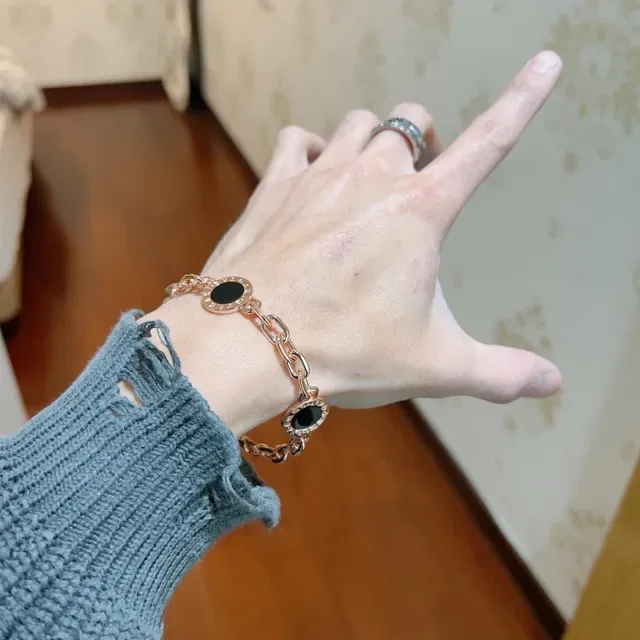 Bvlgari Or Noir Chaîne Curb Chain Trois Motifs Circulaires Bracelet 8