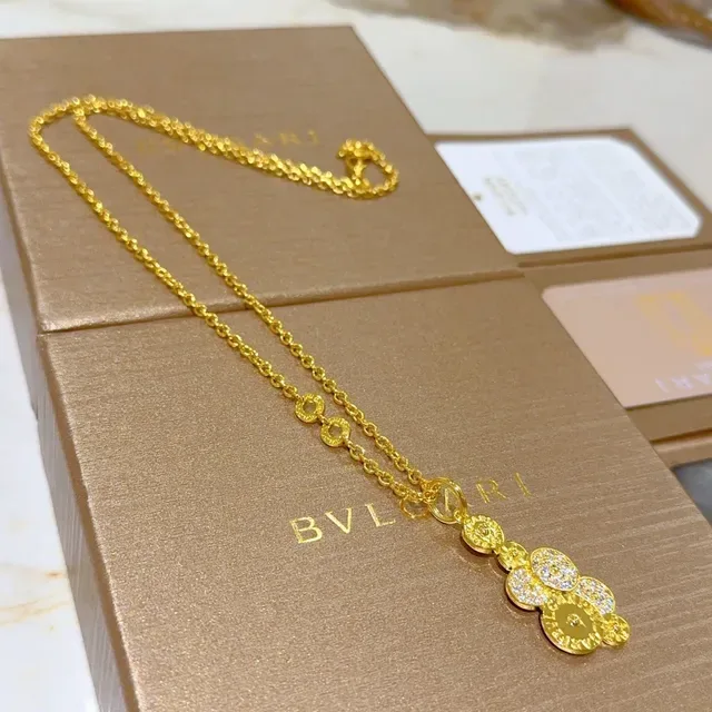 Bvlgari collier chaîne or argent pendentif multi-disques 3