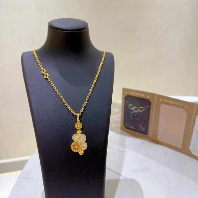 Bvlgari collier chaîne or argent pendentif multi-disques 6