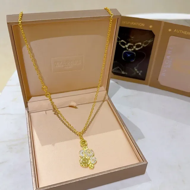 Bvlgari collier chaîne or argent pendentif multi-disques 7