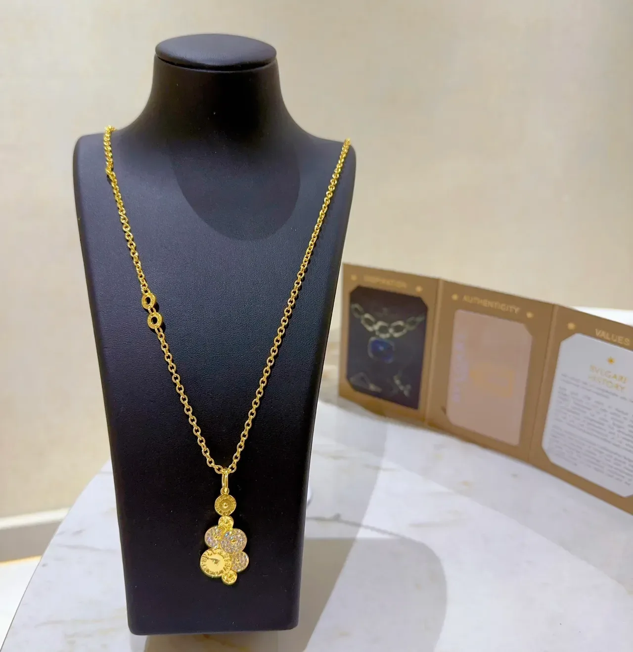 Bvlgari collier chaîne or argent pendentif multi-disques 9