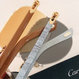 نظارات شمسية Cartier بنية بيضاء بدون إطار أسيتات الصدغ