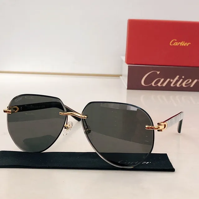 Lunettes de soleil Cartier marron blanc sans monture temple en acétate 9