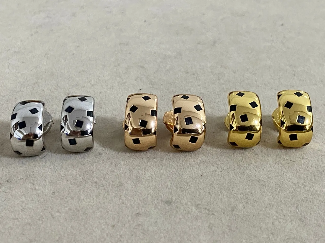 Boucles d'oreilles Cartier ton or et noir géométrique asymétrique 2