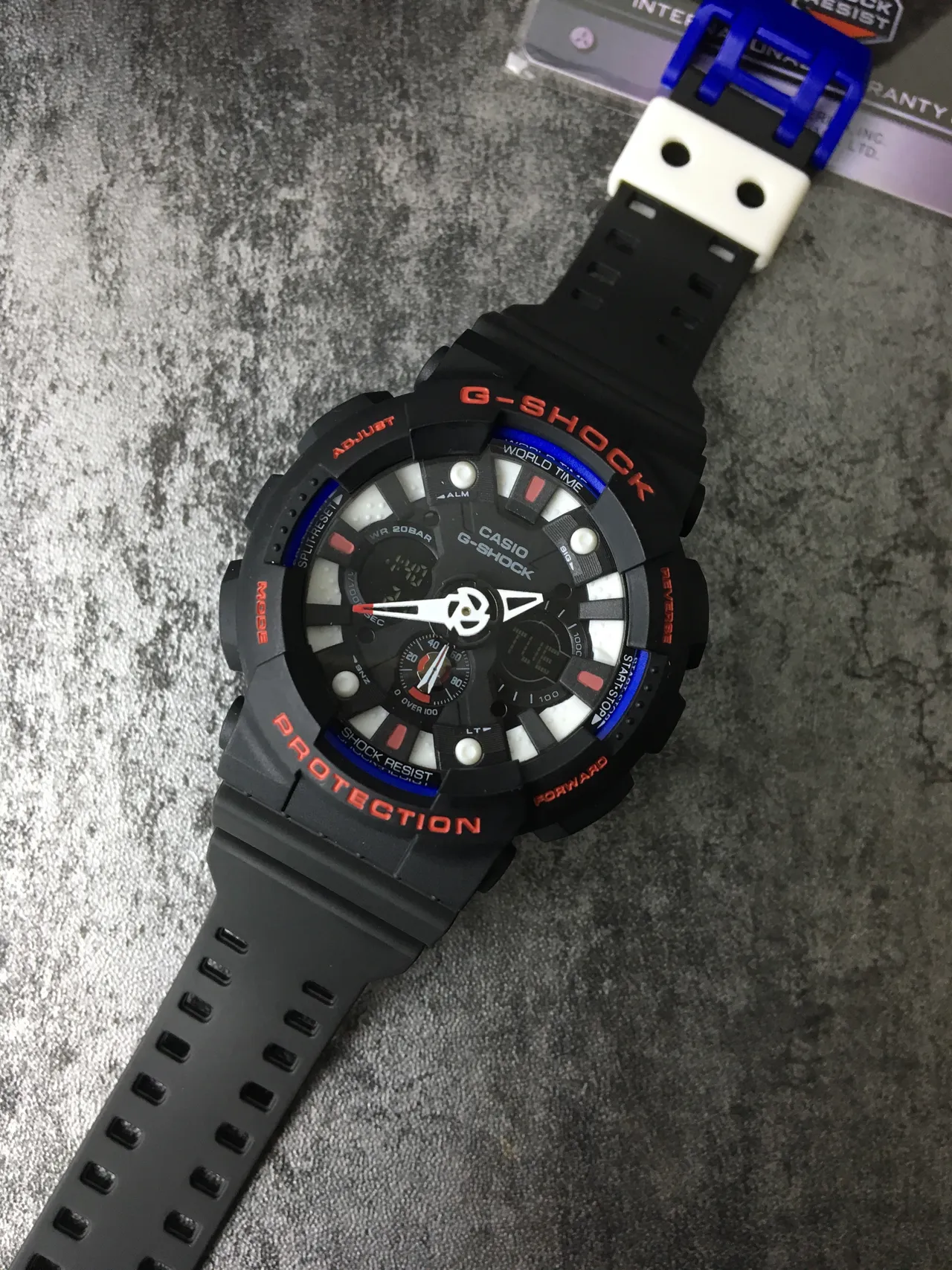 Casio G-Shock GA-100 Noir Orange Bleu Montre Sport 5