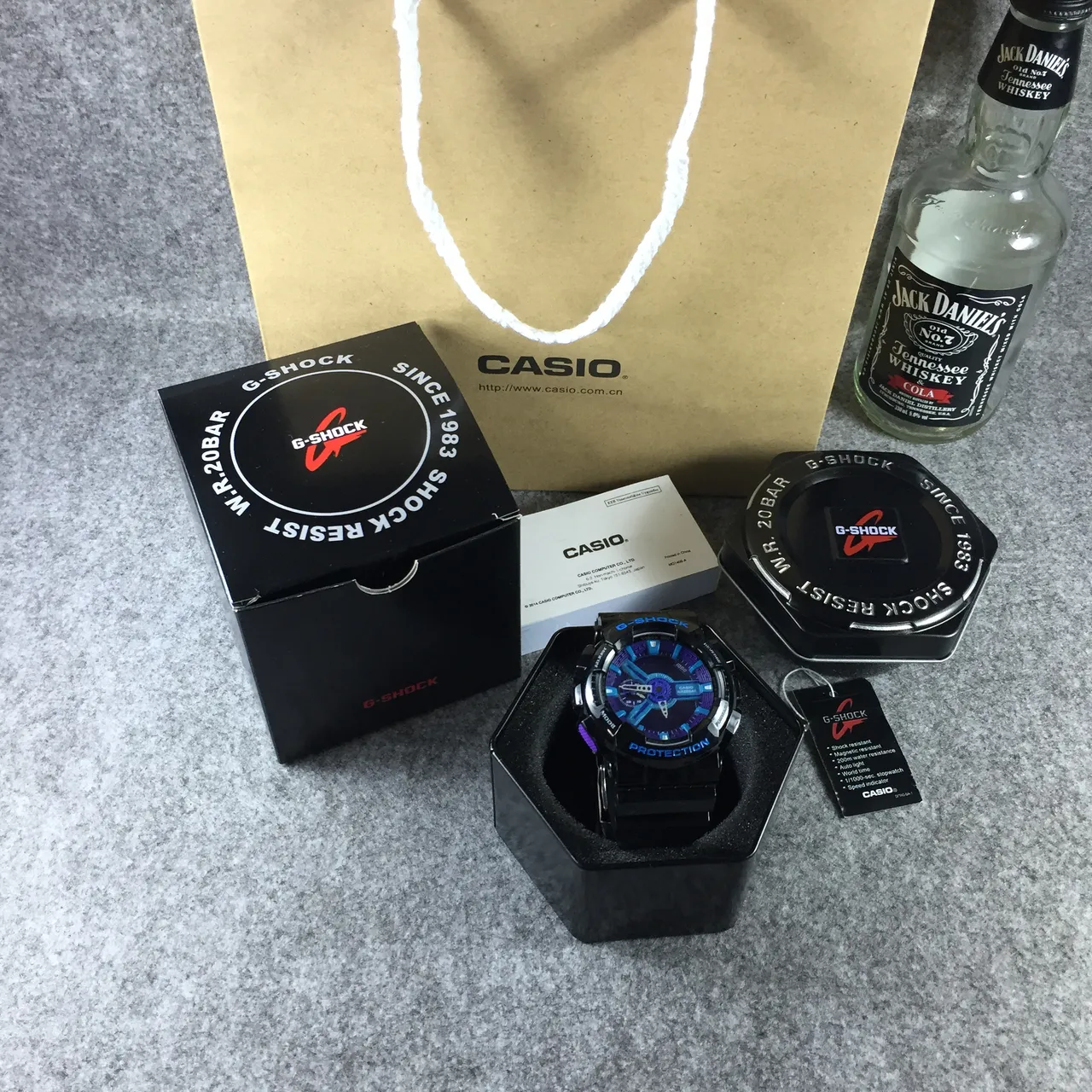 Casio G-Shock GA-100 Noir Violet Cyan Montre Sport 7