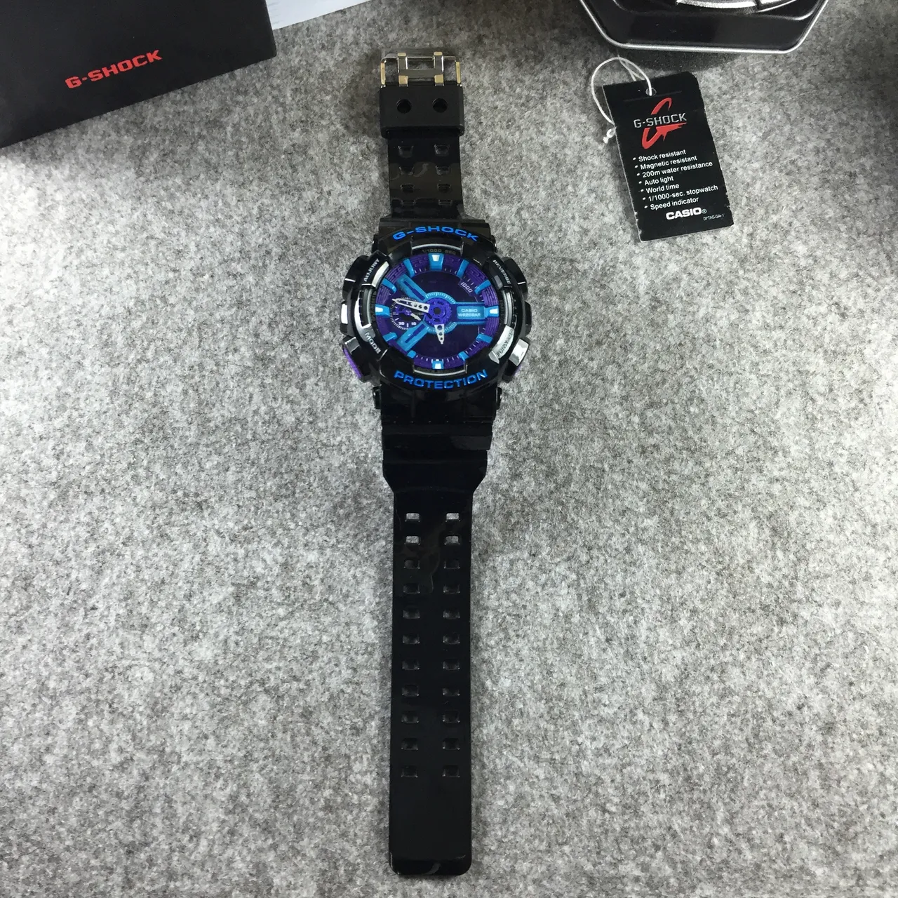 Casio G-Shock GA-100 Noir Violet Cyan Montre Sport 12