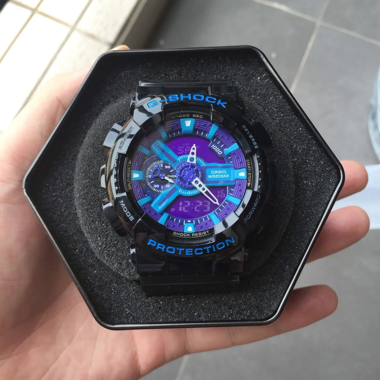 Casio G-Shock GA-100 Noir Violet Cyan Montre Sport 14