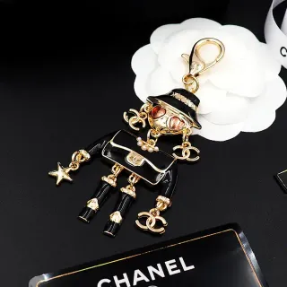 Chanel Black Gold Enamel Figurine Hardware Brooch