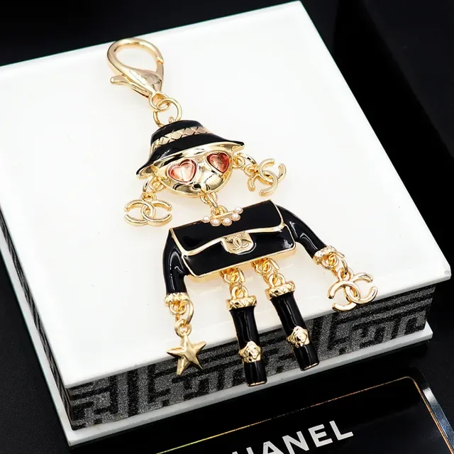 Chanel Black Gold Enamel Figurine Hardware Brooch 7