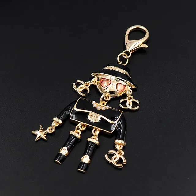 Chanel Black Gold Enamel Figurine Hardware Brooch 9