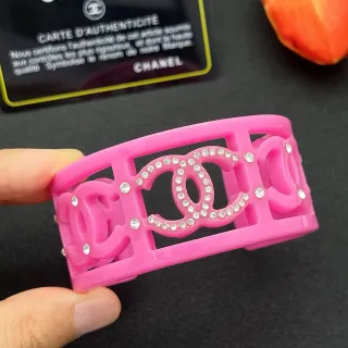 Chanel Pink Transparent Wide Rigid Cuff Openwork CC Motif Bracelet