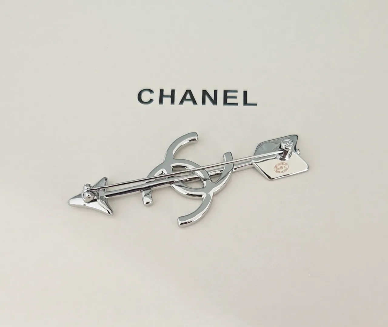 Chanel Silver Black Metallic Arrow Silhouette Interlocking CC Logo Brooch 2