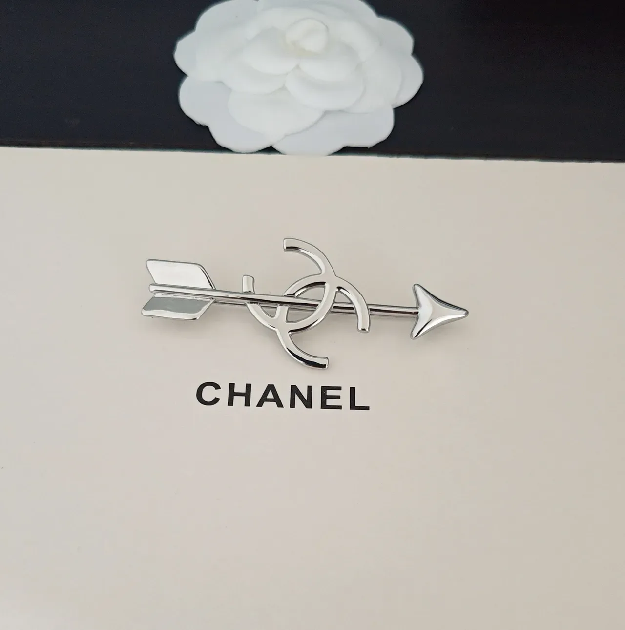 Chanel Silver Black Metallic Arrow Silhouette Interlocking CC Logo Brooch 3