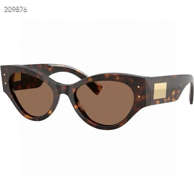Dolce & Gabbana Óculos de Sol Preto Dourado Silhueta Cat-Eye Armação de Acetato 9