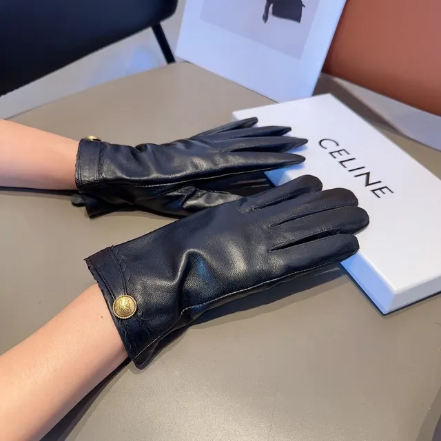 Guantes de cuero negro con puños dorados con borde ondulado 2