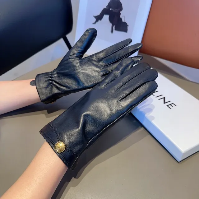 Guantes de cuero negro con puños dorados con borde ondulado 3