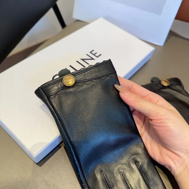 Guantes de cuero negro con puños dorados con borde ondulado 8