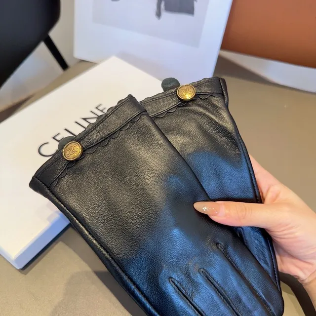 Guantes de cuero negro con puños dorados con borde ondulado 9