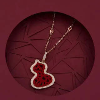Collar con colgante de forma de calabaza burdeos y oro con borde pavé