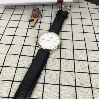 Daniel Wellington ক্লাসিক ব্ল্যাক গোল্ড মিনিমালিস্ট পাতলা কেস কোয়ার্টজ ঘড়ি