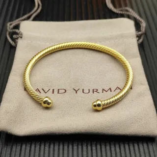 David Yurman Cable Classics سوار مفتوح ملتوي باللون الذهبي المائل