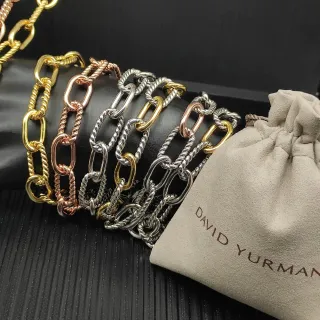 David Yurman سوار ذهب وفضة مع روابط كابل متشابكة وموصلات بيضاوية
