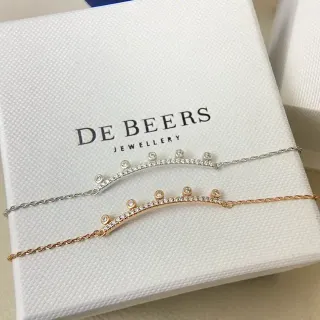 De Beers فضة وذهب تصميم قضيب منحني الماسات المرصعة بالبافيه سوار