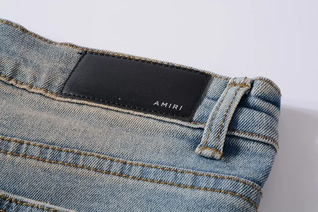 Distressed Paint-Splattered Ripped Cuffed Light Blue Jeans 2