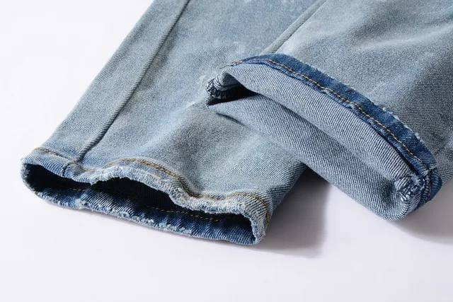 Distressed Paint-Splattered Ripped Cuffed Light Blue Jeans 4
