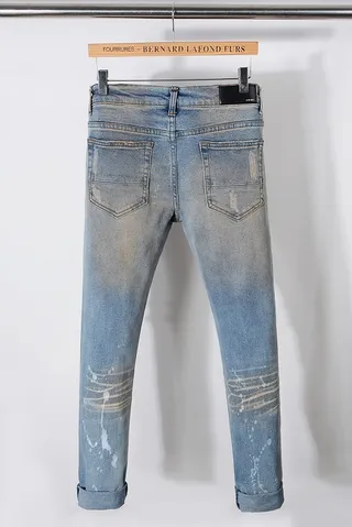 Distressed Paint-Splattered Ripped Cuffed Light Blue Jeans 7