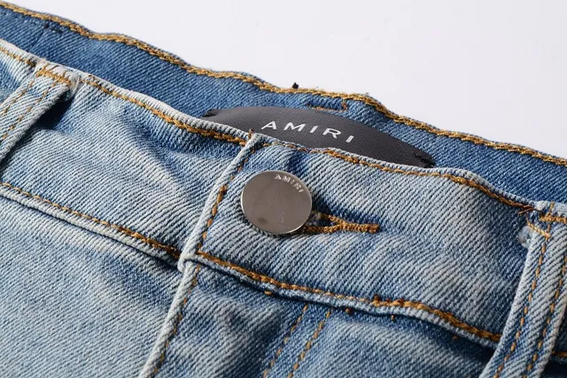 Distressed Paint-Splattered Ripped Cuffed Light Blue Jeans 9