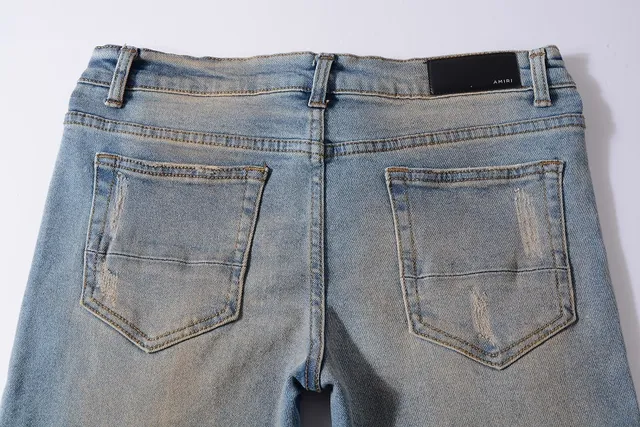 Distressed Paint-Splattered Ripped Cuffed Light Blue Jeans 13
